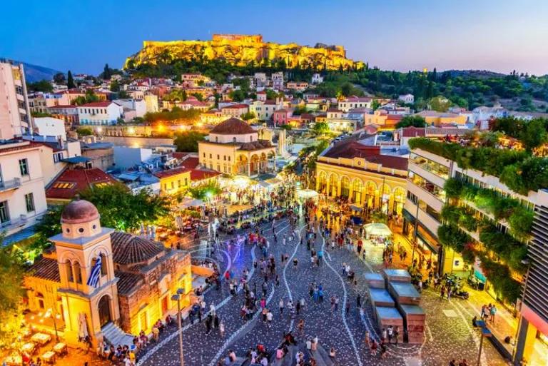 Athens, Greece -  Night image with Athens from above, Monastiraki Square and ancient Acropolis.